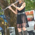 Jen playing flute at Pioneer Days, Canyonville, Oregon